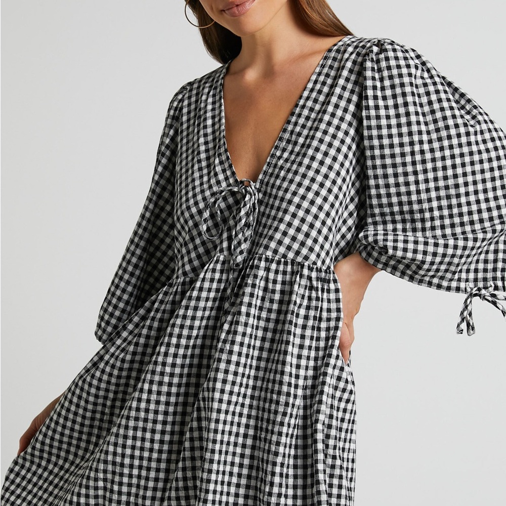 SHOWPO ROSITA MINI DRESS - TIE FRONT PUFF SLEEVE DRESS IN BLACK AND WHITE CHECK